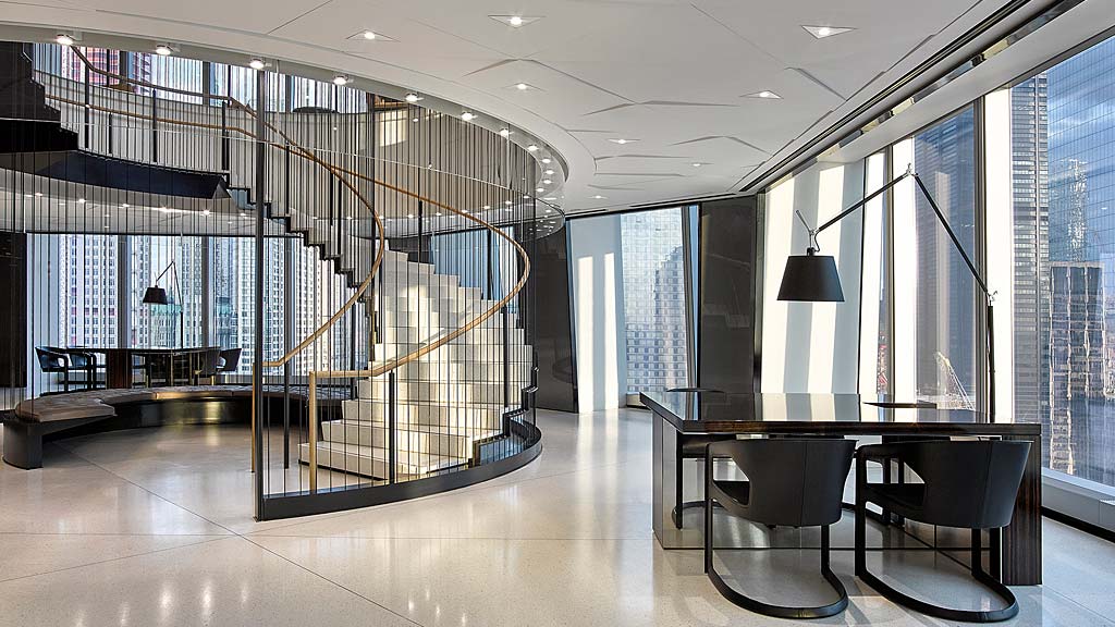 A room with a table and chairs.