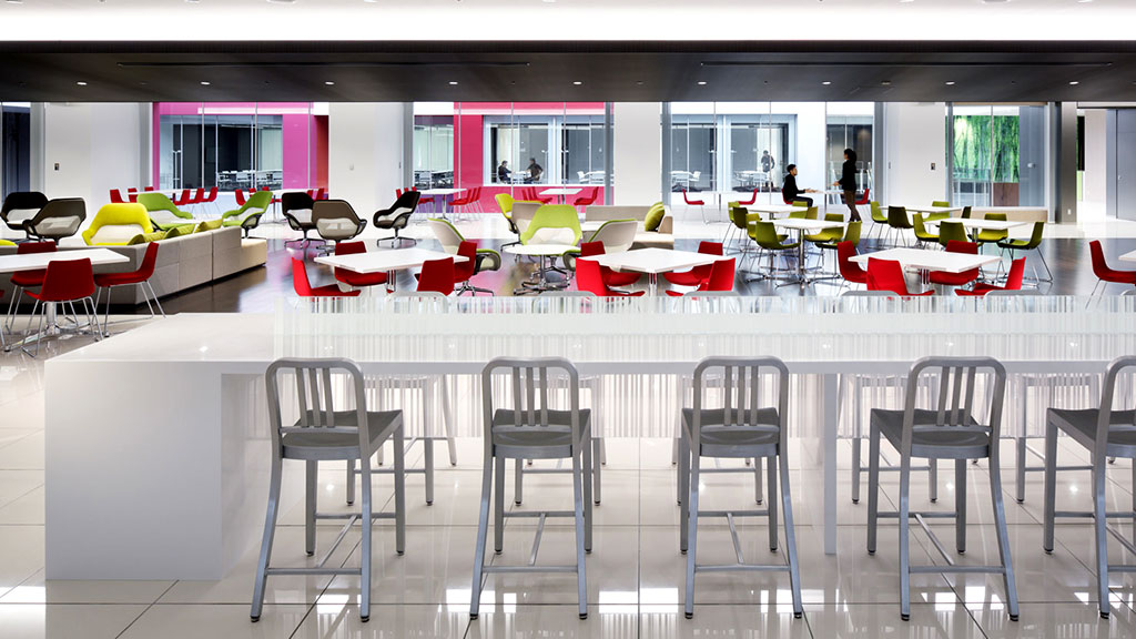 A room with tables and chairs.