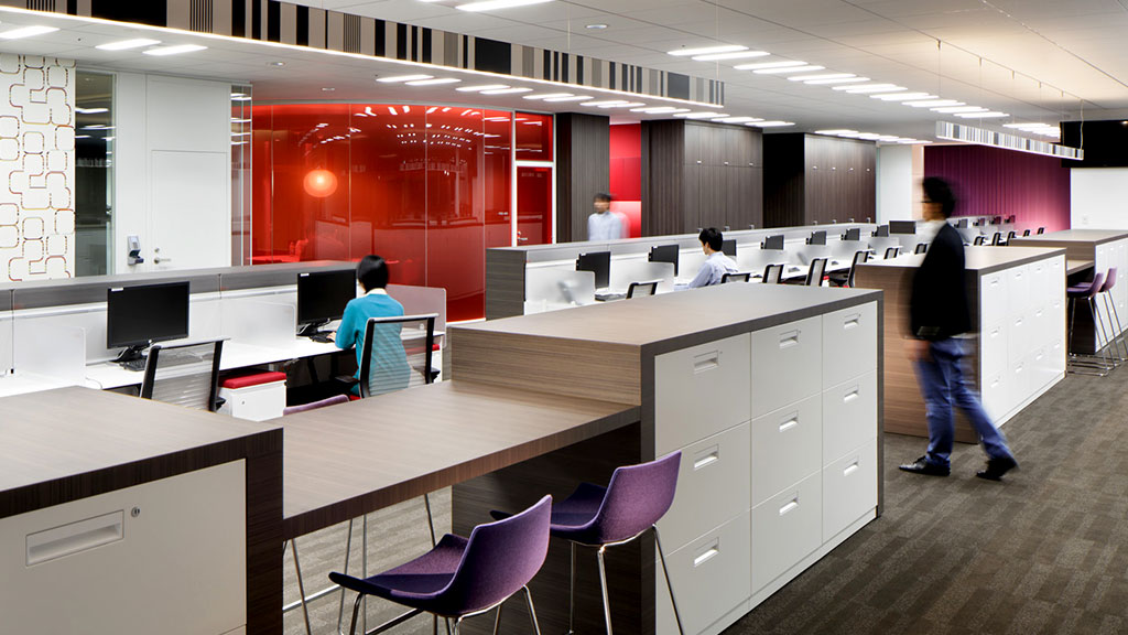 A group of people in an office.