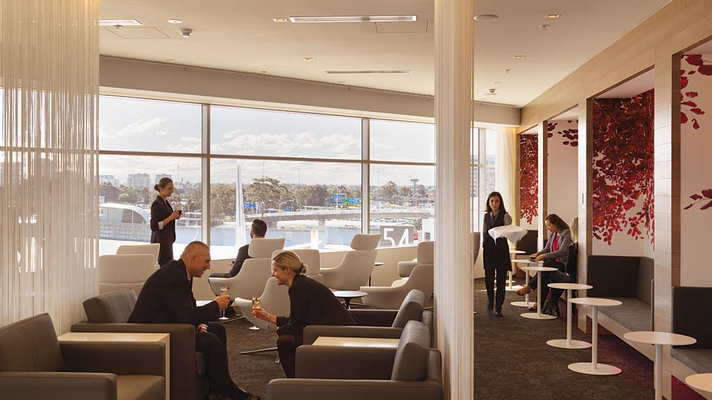 A group of people sitting in a living room.