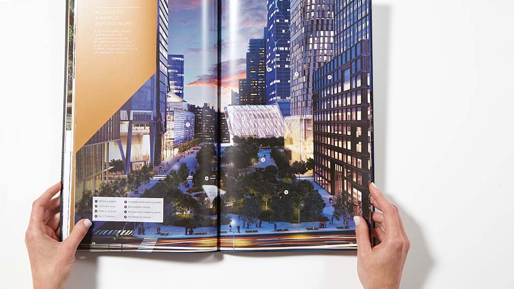 A person holding a tablet.