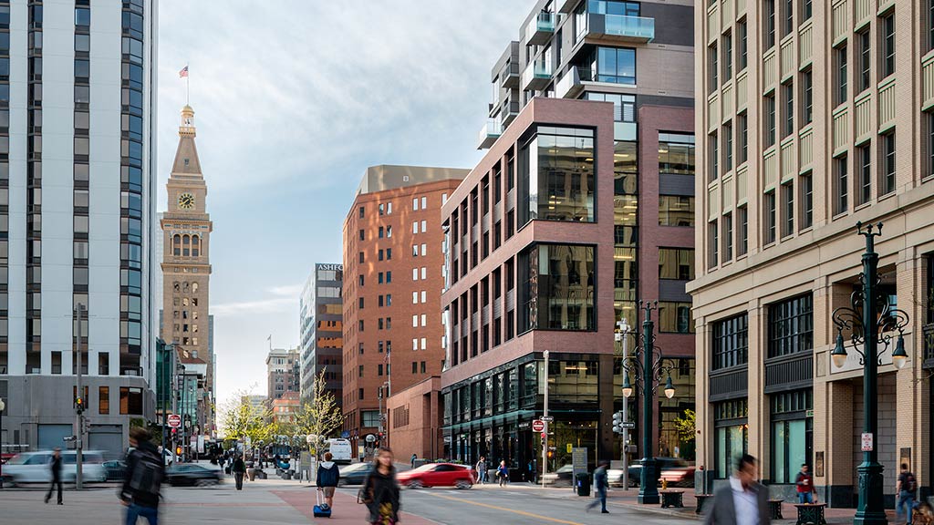 A city street with tall buildings.
