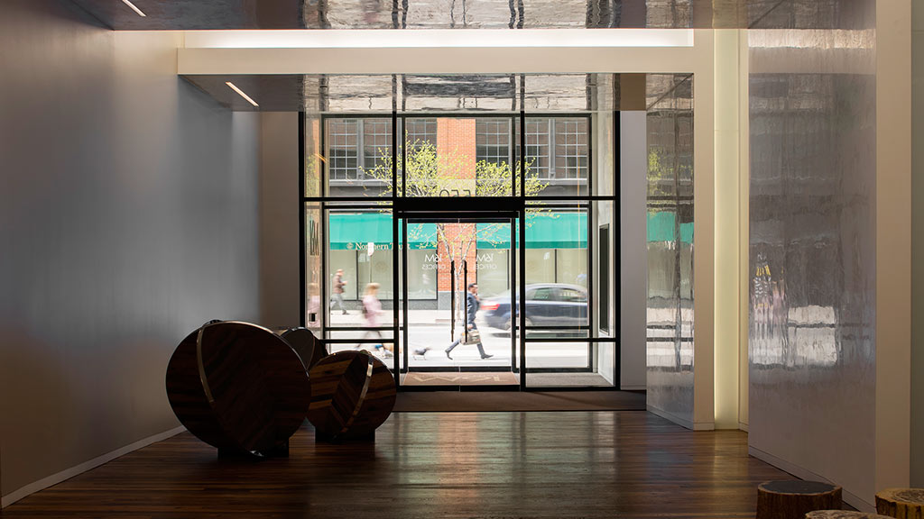 A room with a large glass door.