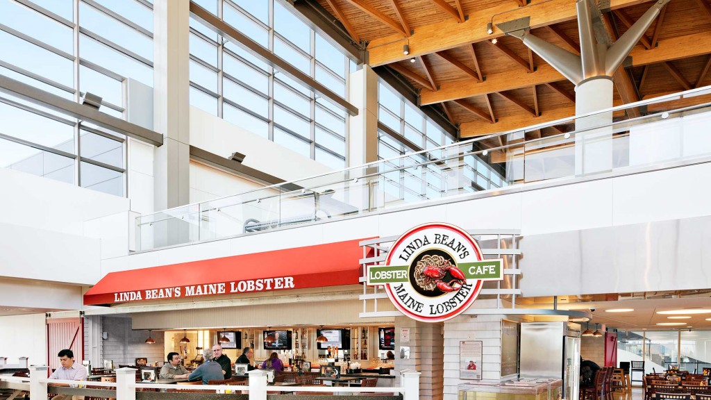 A large building with tables and chairs.