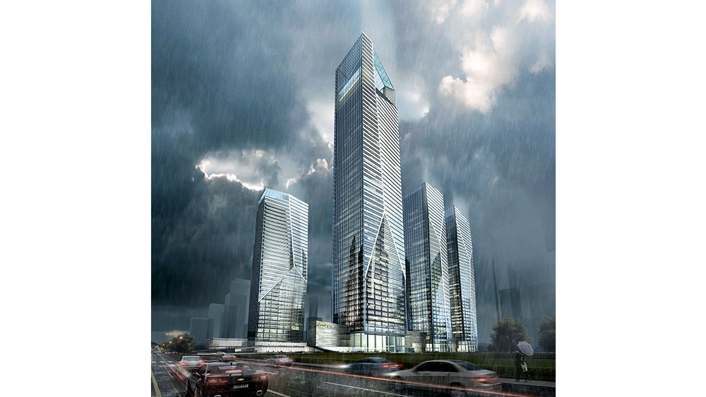 A couple of skyscrapers in a city.