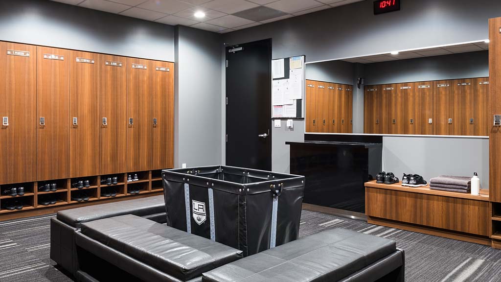 A room with a large black table and a large black machine.