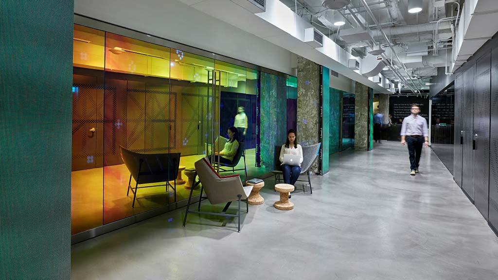 A few people in a building.