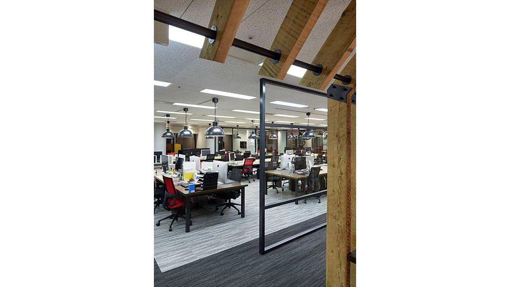 A room with tables and chairs.