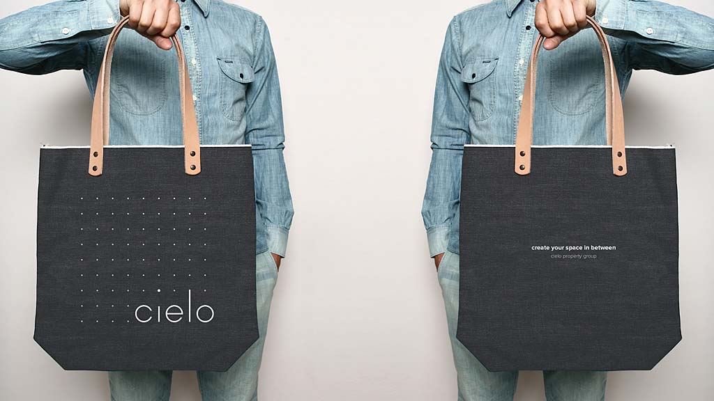 A person holding a bag.