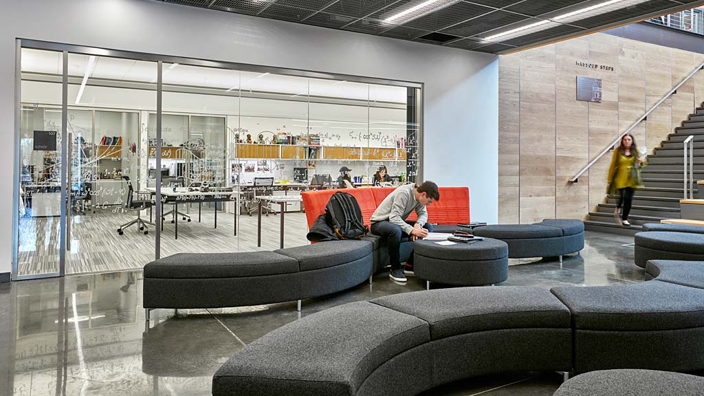 A person sitting on a couch.