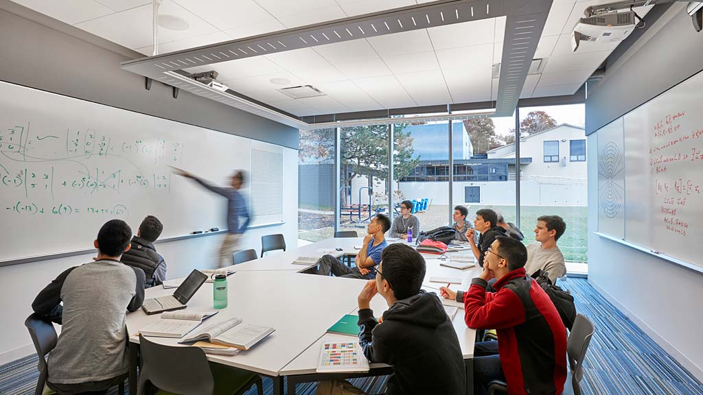 A group of people in a meeting.