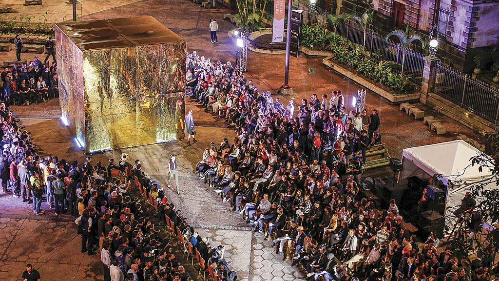 A large crowd of people at a concert.