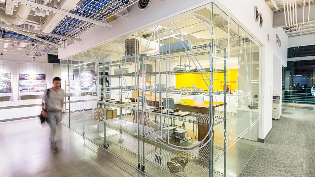 A person walking in a large room.