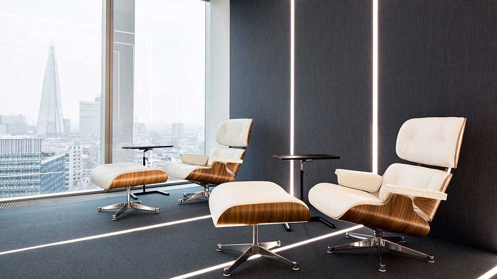 A room with chairs and a table.