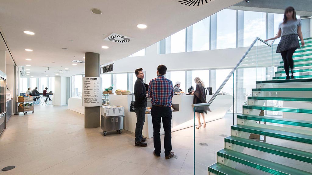 People standing in a building.