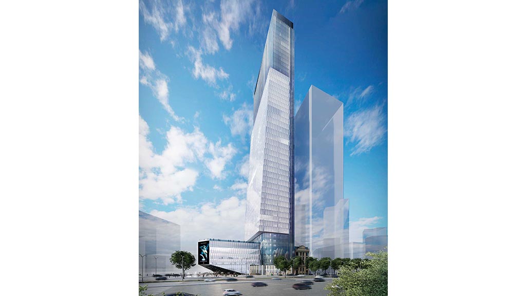 A tall building with a road below.