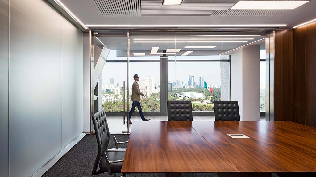 A person walking in a room.