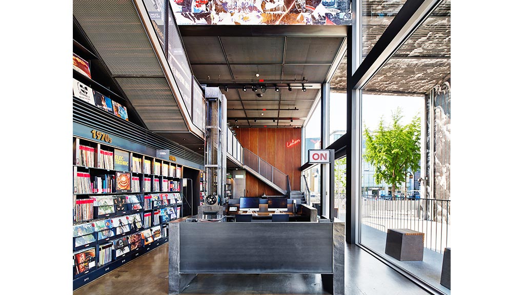 A store front with a large window.