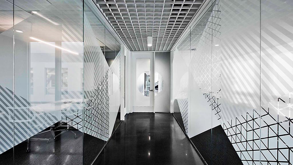 A hallway with white walls.