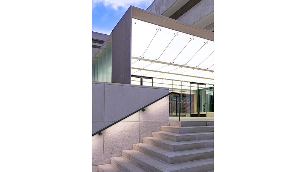 A building with a glass wall.