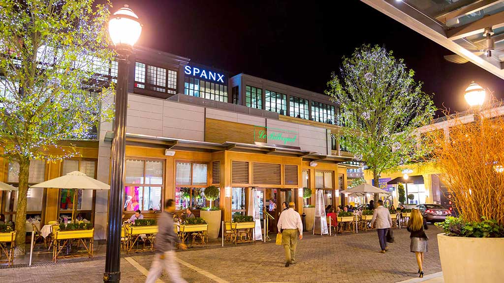 People walking outside a building.