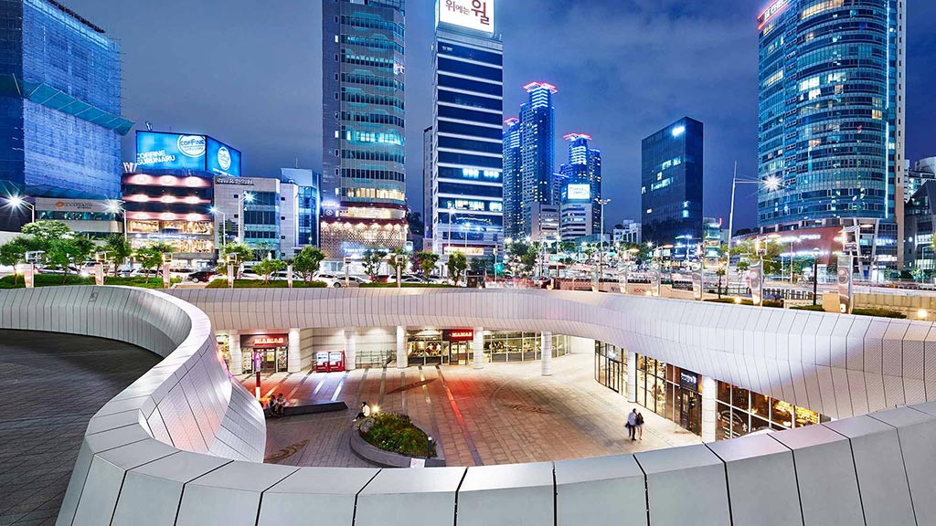 A city skyline with a river.