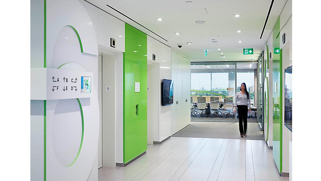 A person standing in a hallway.