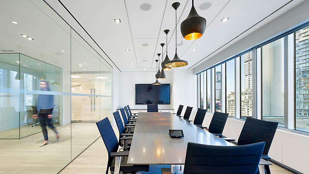 A room with a table and chairs.