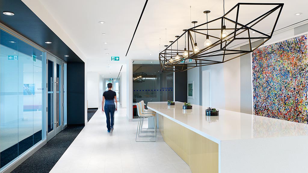 A person walking in a hallway.