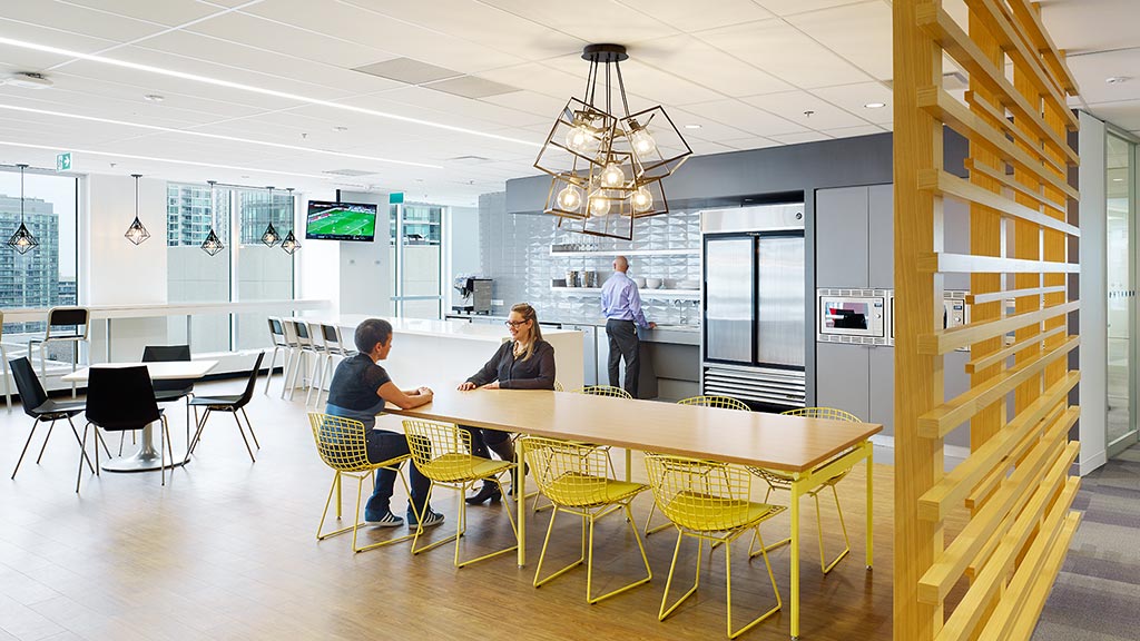 A few people sitting at a table.