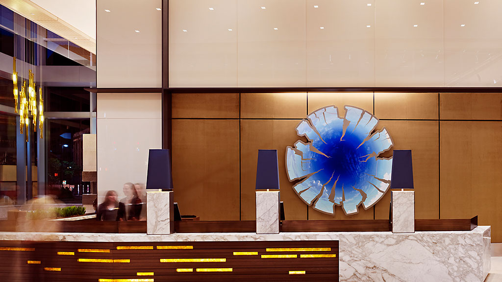 A building with a large glass window.