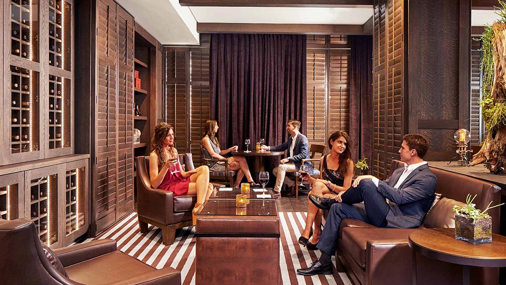 A group of people sitting in a living room.