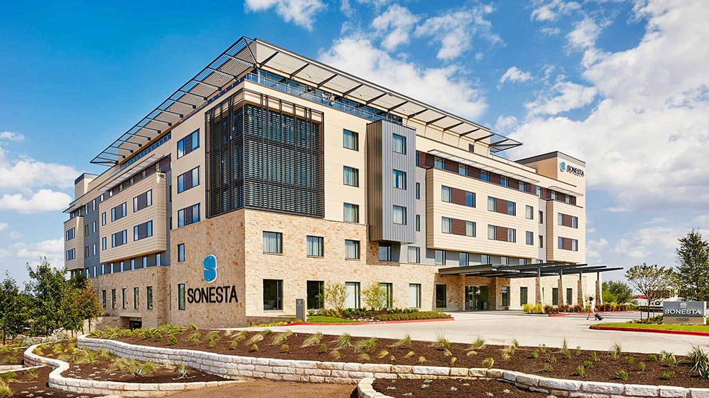 A building with a glass front.