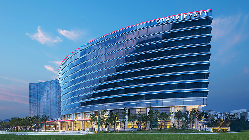 A large building with a glass front.