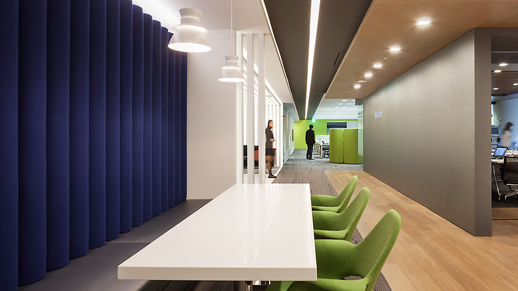 A room with a table and chairs.