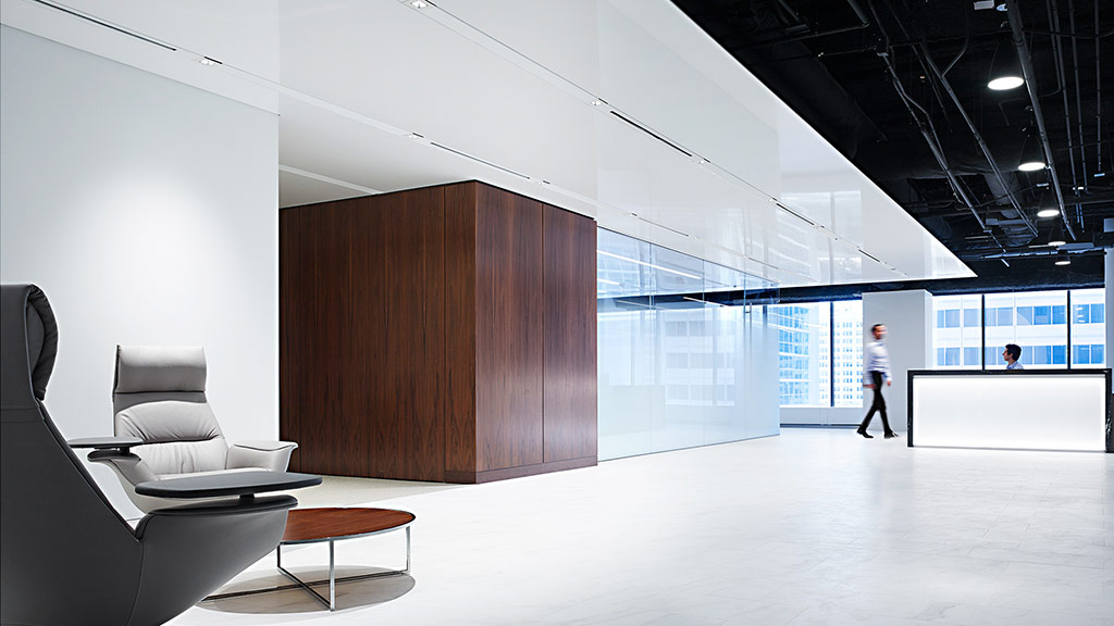 A person walking in a large room.