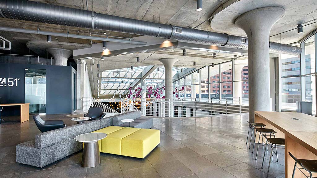 A room with tables and chairs.