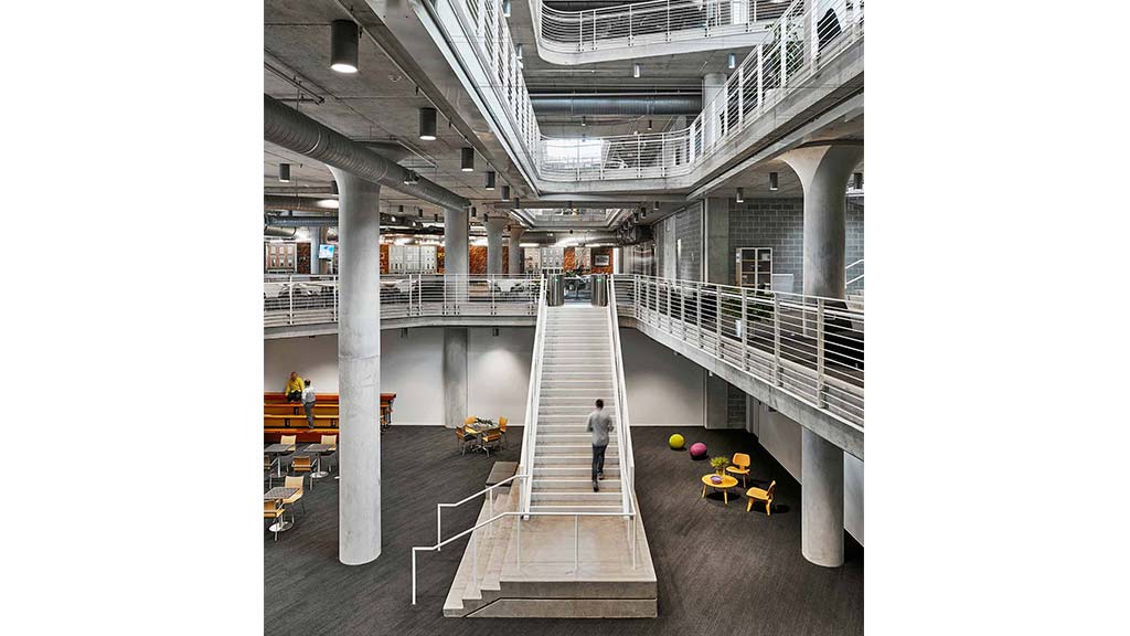 A person walking up a flight of stairs.