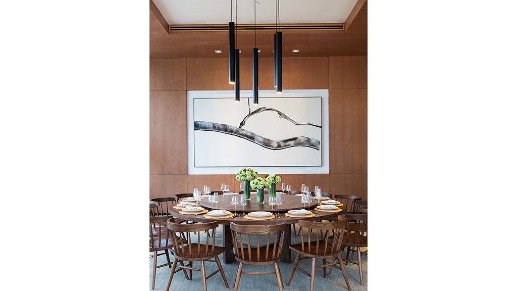 A table with plates and glasses on it.