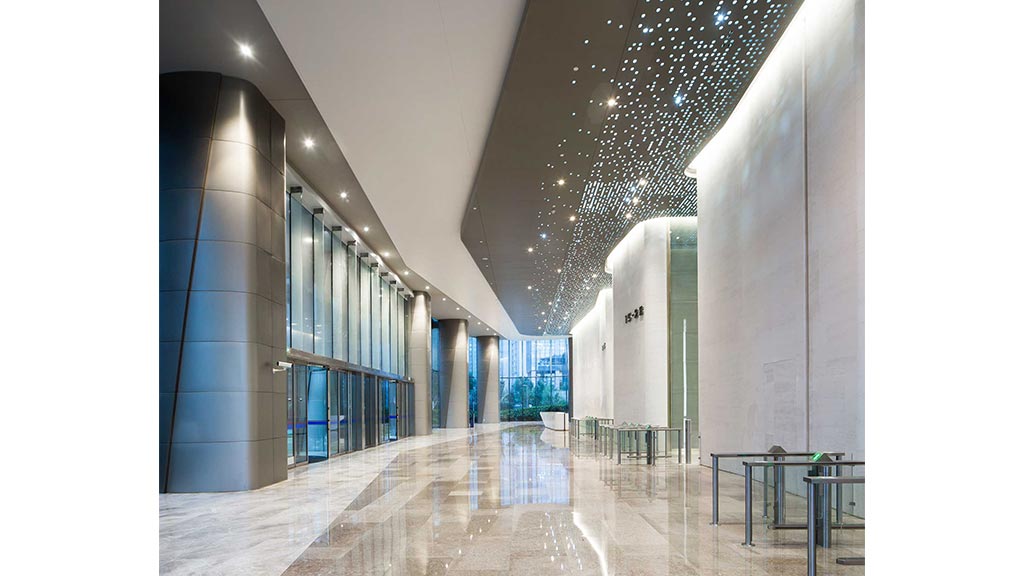 A long hallway with white walls.