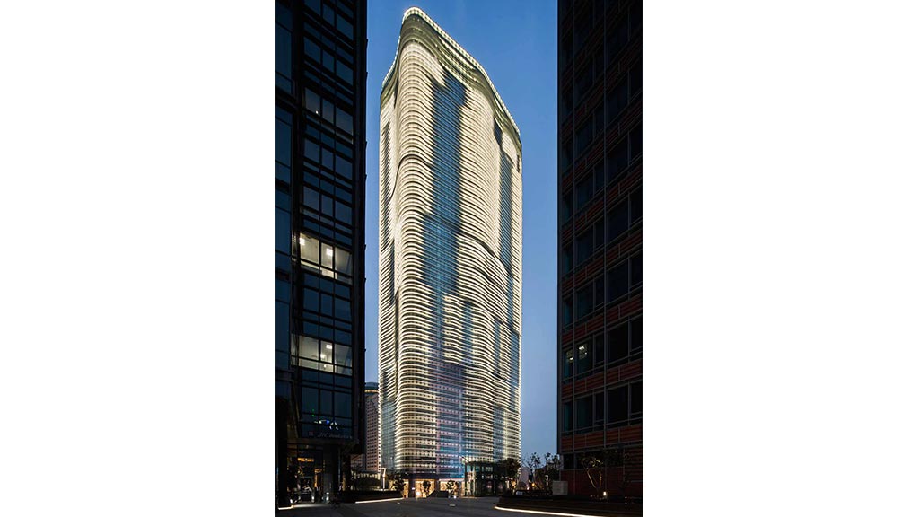 A tall building with many windows.