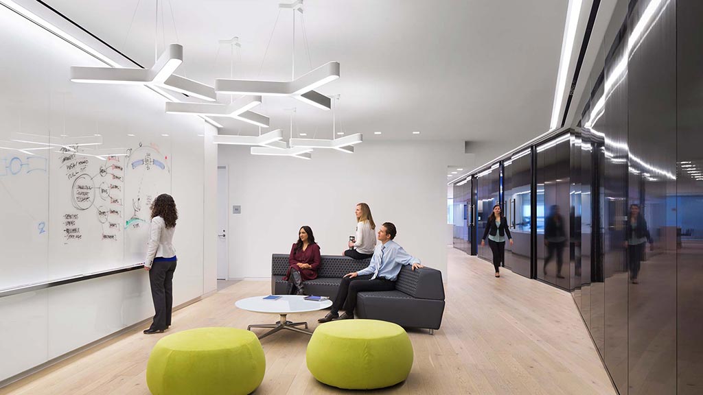 A group of people in a room.