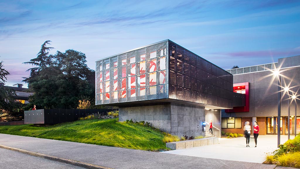 A building with a large glass window.