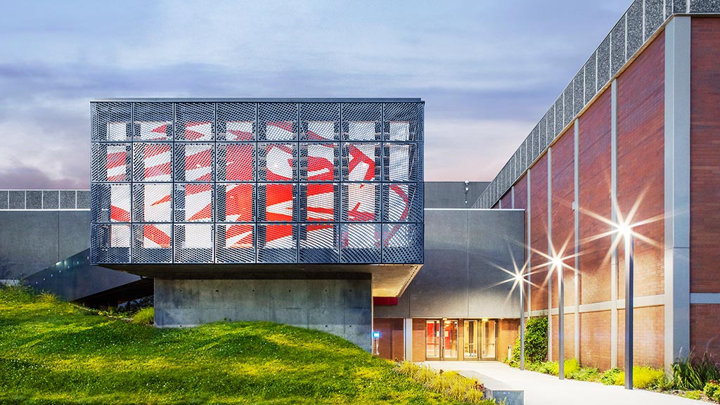 A building with a large glass window.