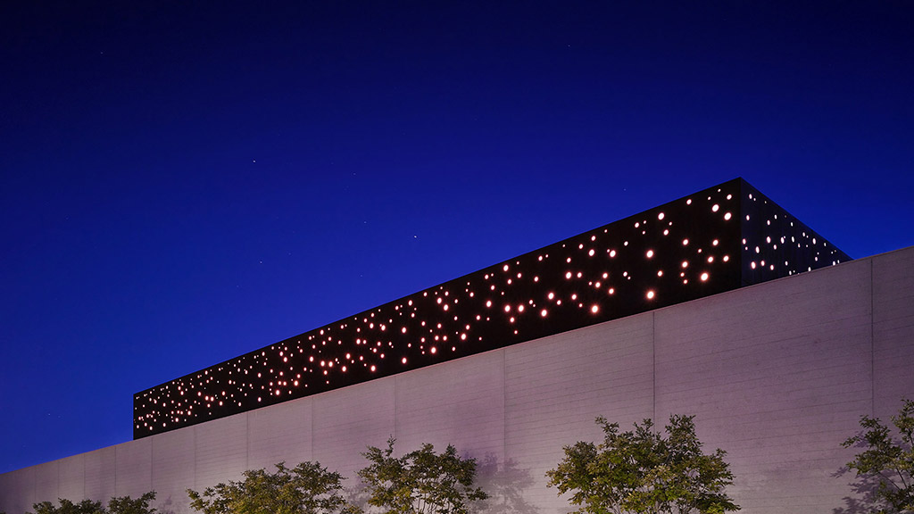 A building with lights on.