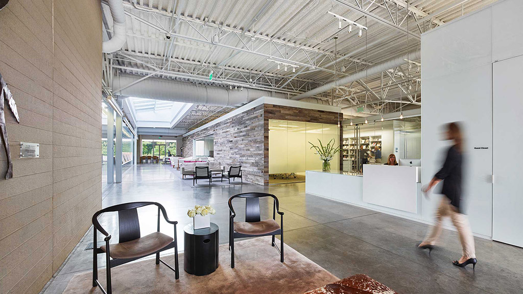 A person walking in a room.