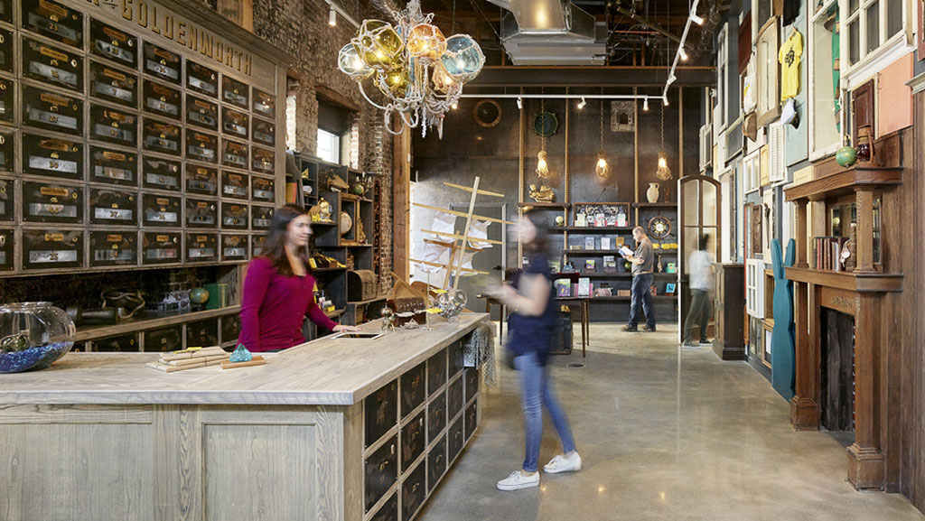 A person standing in a bar.