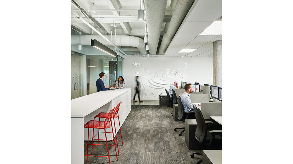 A group of people in an office.