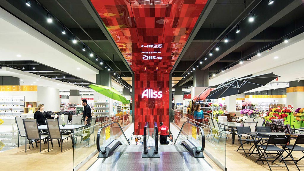 A large room with tables and chairs.