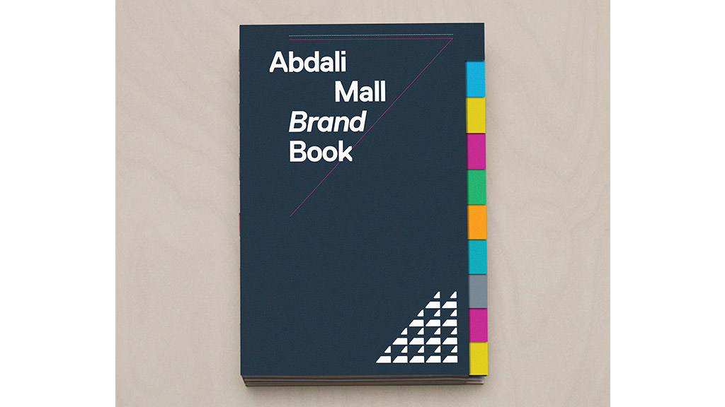 A black book with a white and blue cover.